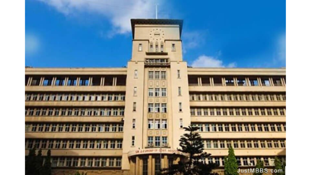 Front view of Grant Medical College Mumbai’s historic colonial-style main building surrounded by greenery