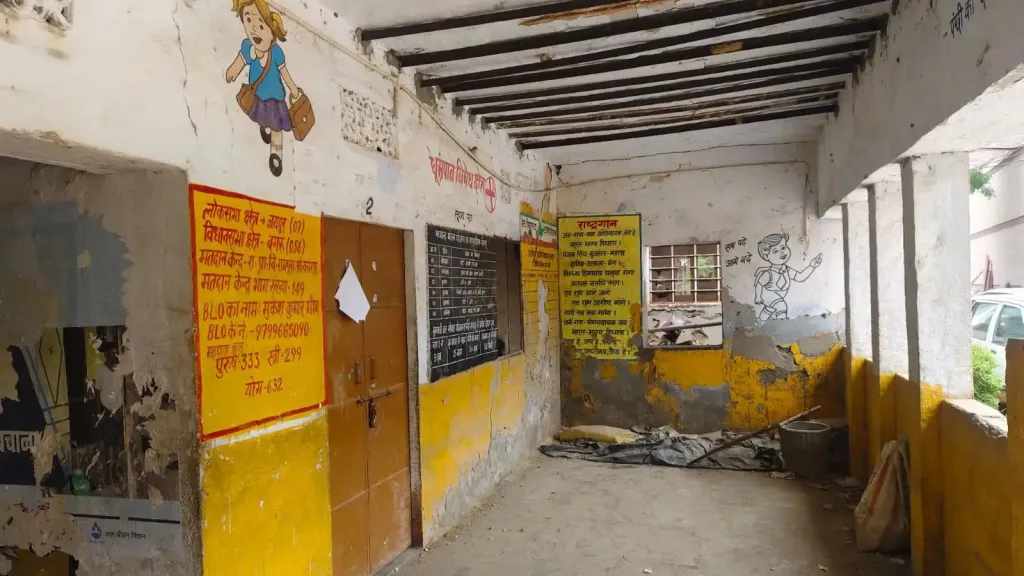 The old school building is now abandoned, with paint peeling, the colourful lettering and murals fading.