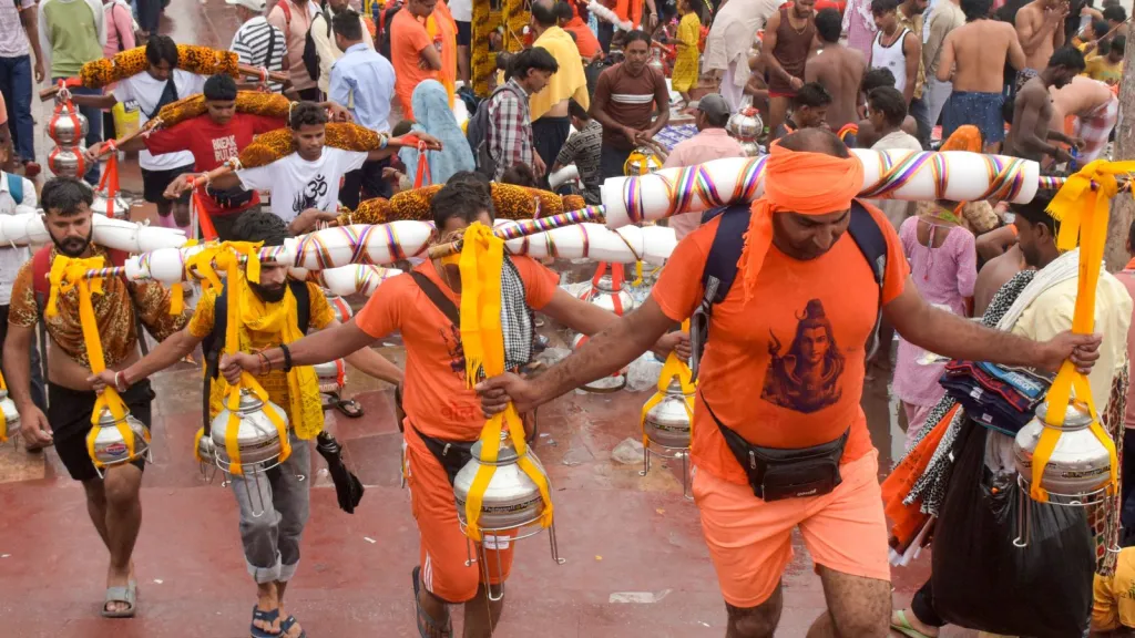 ‘Kanwariya’ carry holy water for their pilgrimage in the month of ‘Shravan’, in Haridwar.